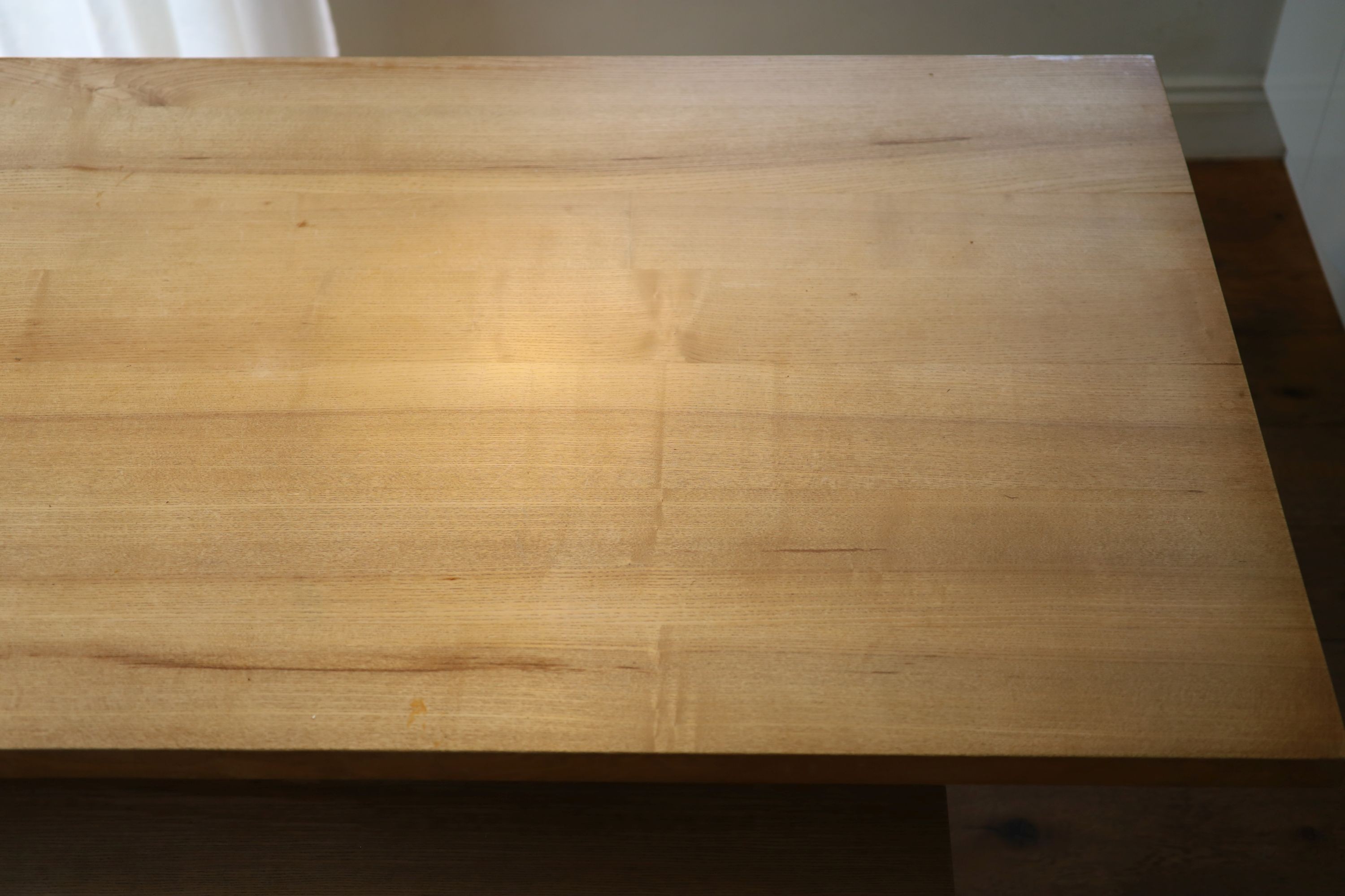 A contemporary oak kitchen table with pair of matching benches and oxidised metal supports, table width 230cm depth 90cm height 74cm, benches width 180cm